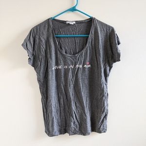 Love is in the air graphic tee